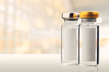 Insulin vials against a background: properly cooling and storing insulin.