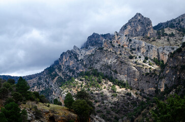 Fototapeta na wymiar rugged mountain scenery on a cloudy autumn day. Sierra de Segura, Spain.