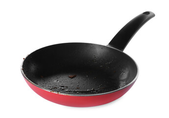 Dirty red frying pan isolated on white