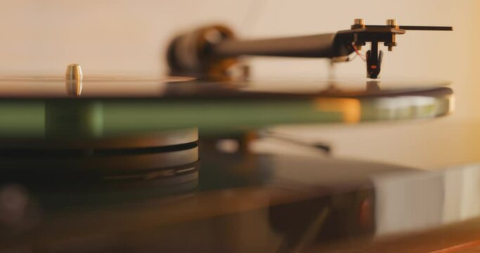 Close up of vinyl record spinning on turntable 