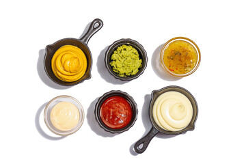 Set of sauces isolated on white background. Ketchup, mustard, mayonnaise, wasabi, sweet curry