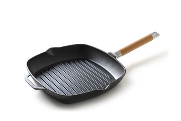 Empty cast iron grill pan with wooden handle isolated on white background. Side view
