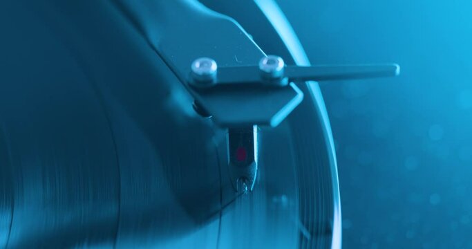 Close up of vinyl record spinning on turntable 
