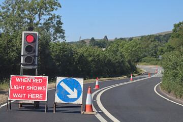 Waiting at roadworks controlled by traffic lights in Somerset, England. No traffic is approaching...