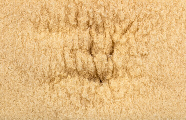 Yellow worn sponge, as background for computer, phone...