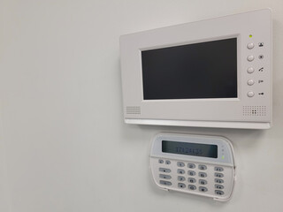 Obraz premium smart screen with smart home apps on wall in modern apartment