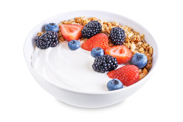Fresh breakfast with greek yogurt nuts oatmeal granola with berries in a bowl on a white isolated background