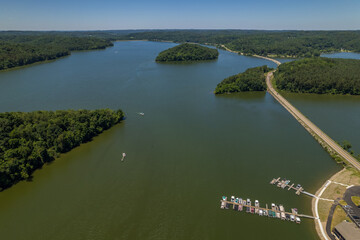 Lake with Marina and Roadway with Blue Sky