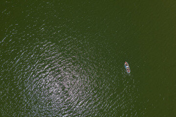 Looking Down on Fishing Boat in Green Water