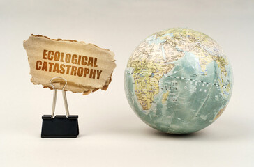 Near the globe there is a clip with a cardboard plate on which it is written - Ecological...
