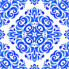 Seamless blue floral watercolor pattern tiles and fabric design.