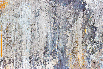 Rough concrete peeling wall. Dirty damaged texture, peeling plaster, damaged wall. Vintage background