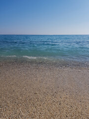 Fototapeta na wymiar Beautiful waves of Cleopatra sea beach in Alanya, Turkey