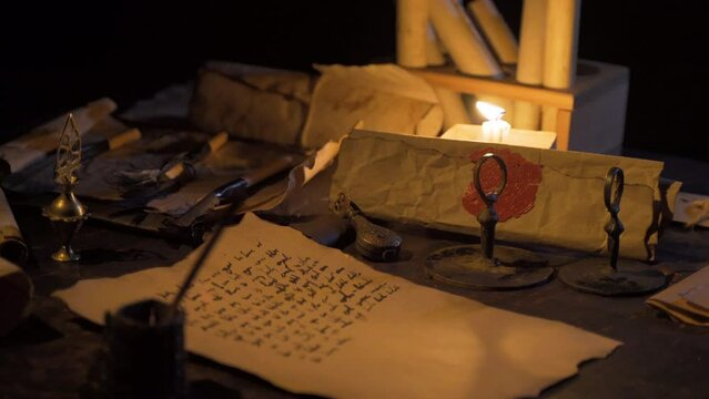 Burning candlelight and old papyrus paper in ancient times.
Inscriptions written on paper by candlelight.
