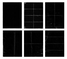 Set of folded paper with grungy texture in black background. can be used to replicate the aged and...