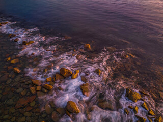 Top down rocks and the sea in the early morning light
