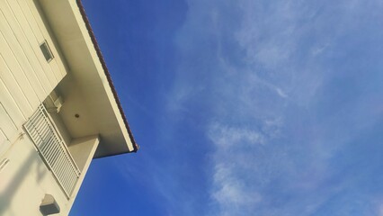 Abstract background of a house's roof with cream color during sunny day