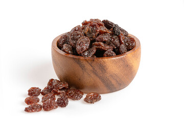 Bowl of raisins isolated on white background.
