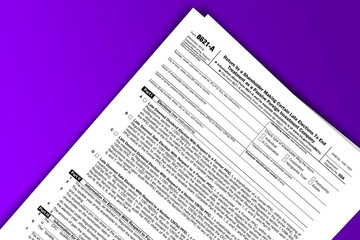 Fototapeta premium Form 8621-A documentation published IRS USA 41437. American tax document on colored