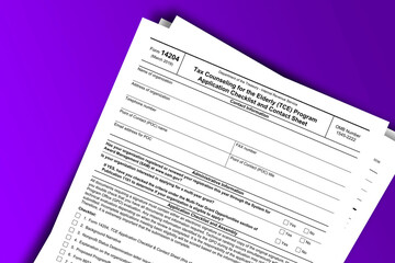 Form 14204 documentation published IRS USA 03.14.2019. American tax document on colored