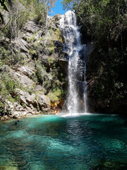 waterfall in a blue lake