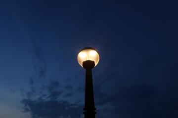 Fototapeta na wymiar Lantern - a device for lighting the street at night