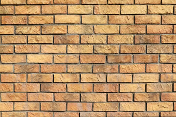 Antique rock style, yellow and brown brick wall texture.  Flat photograph for architectural CG rendering and perspective drawings. 明るい茶色のレンガ塀のテクスチャー。