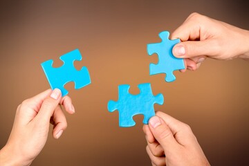 ESG concept of environmental, social, and governance. Hand of people holding a piece of jigsaw puzzle in solving environmental, social