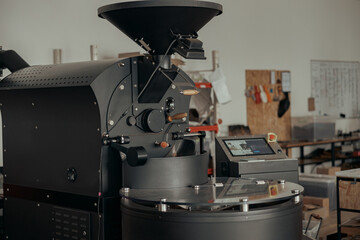 Close up of coffee roasting machine in small coffee manufacturing
