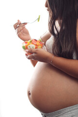 Pregnant woman eating fruits white background, Space for text