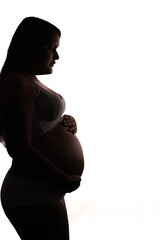 Pregnant silhouette on white background, studio, close up