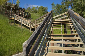 Fototapeta na wymiar Wooden stairs to Crescent Heights Lookout Point in Calgary,Alberta Province,Canada,North America 