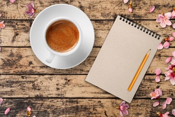 Obraz na płótnie Canvas Summer or spring breakfast with coffee, flowers on the desk