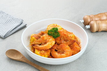 Udang Saus Padang (Shrimp in Chili Sauce), traditional food from Padang, Indonesia. Served in white bowl.
