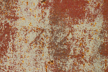 The texture is a rusty metallic orange painted surface with paint cracks and rust spots. background