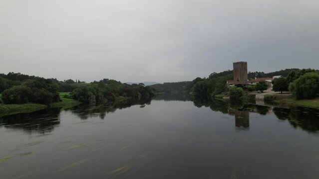 Border of Portugal and Spain. Mon&ccedil;&atilde;o, Medieval Tower of Lapela Aerial View. River Minho, Portugal