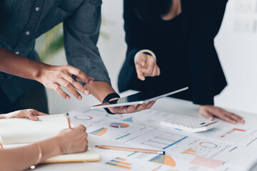 Group of Business planning business strategy and brainstorming to analyze direction global economy....