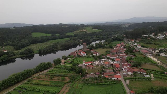 Fly Above Village and Medieval Castle of Lapela. River Minho in the Background. Mon&ccedil;&atilde;o, Portugal