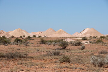 Mullock heaps on the outskirts of the opal mining town of Coober Pedy in the remote outback of South Australia.