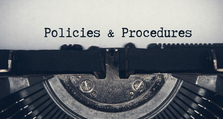 Policies and procedures text typed on an old vintage typewriter. Rules concept - obrazy, fototapety, plakaty