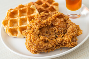 fried chicken waffle with honey or maple syrup