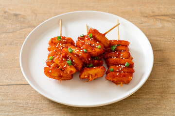 deep fried Korean rice cake (Tteokbokki) skewered with spicy sauce