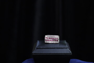 Fine jewelry with diamond and gemstone with black background