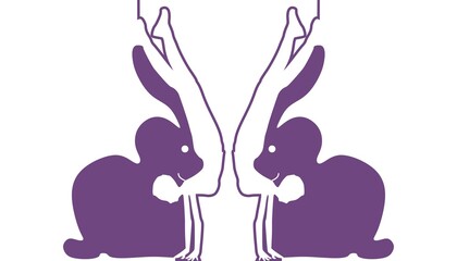 Optical illusion. Two beautiful women make silhouette of rabbit