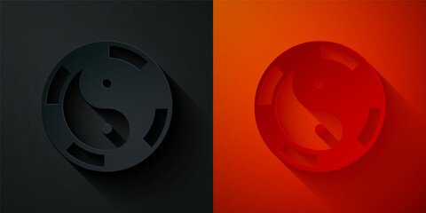 Paper cut Yin Yang symbol of harmony and balance icon isolated on black and red background. Paper art style. Vector