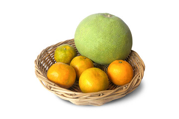 Orange and grapefruit (Citrus maxima) fruits in separate basket on white background.
