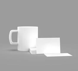 White mug with white business cards on a gray background.