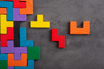 Creative idea solution - business concept, jigsaw puzzle on the grey background. Leadership and...