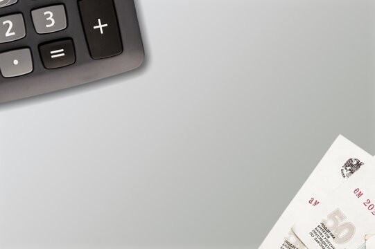 Economy and taxes. The Tax on Circulation of Goods and Services. A calculator and money