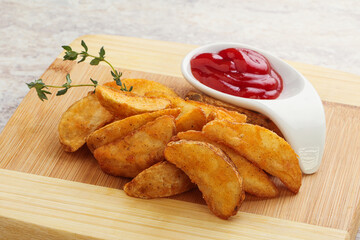 Fried rustic potato with tomato ketcup
